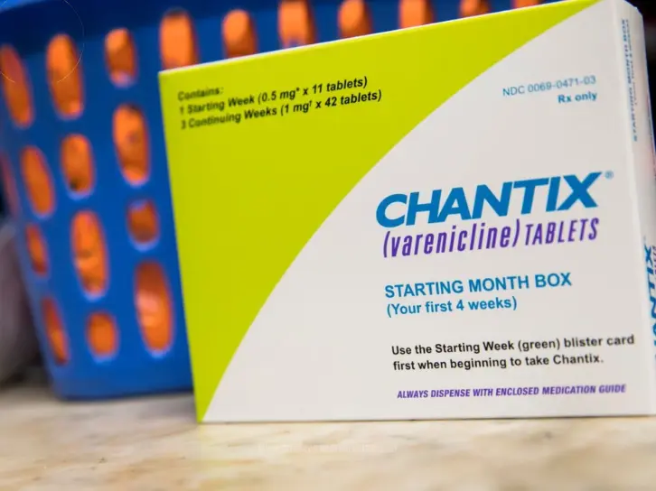 Attorneys reviewing Chantix lawsuits against Pfizer for alleged side effects and defective drug claims explained