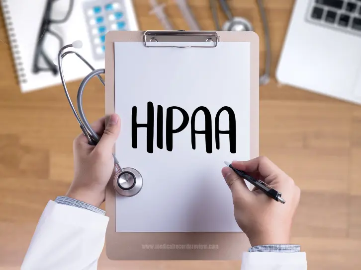 Attorney reviewing medical records to ensure HIPAA compliance and protect client confidentiality